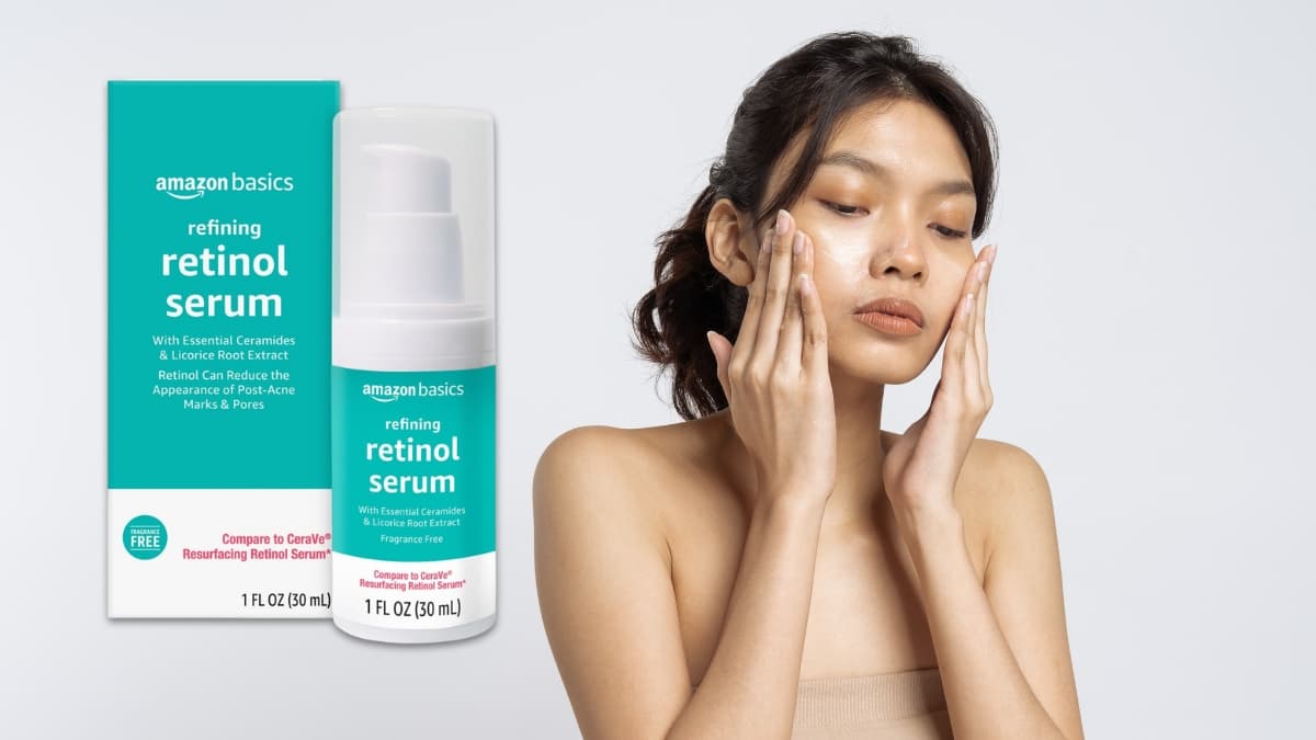 A woman applies Amazon Basics Retinol Serum for Face while the product packaging is shown beside her.