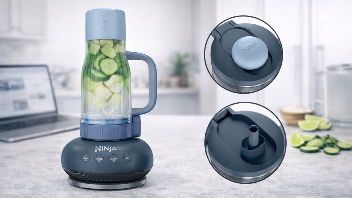Ninja BlendBOSS™ Tumbler Blender with cucumber and lime inside 26 oz cup on kitchen counte