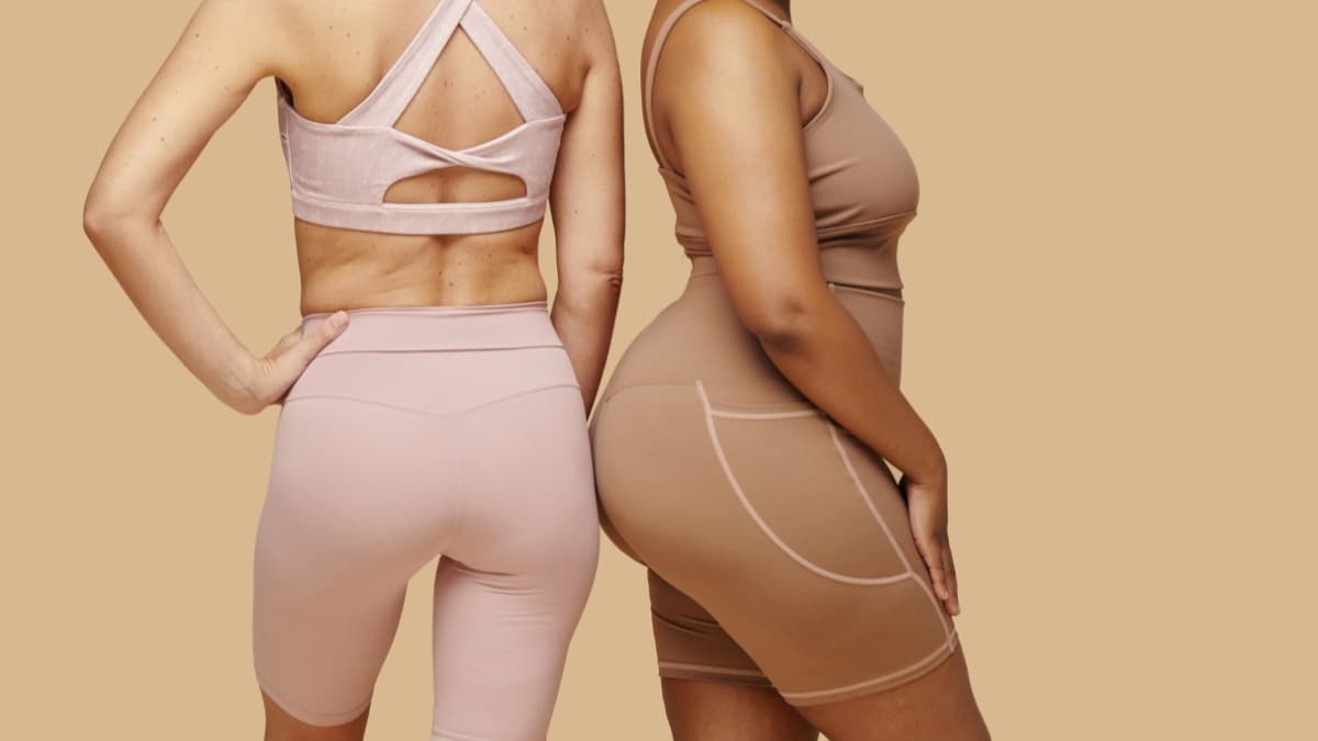 Women wearing Evelyn & Bobbie smoothing slip shorts showing seamless fit and support